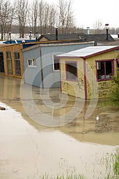 Spring Flood Disaster with Snow Flurries