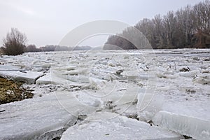 Spring flood, ice floes on the river photo