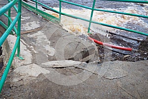 Spring flood. Rushing water in the river. Dark ferrous water rushes in the stream. Karelia, Lososinka River in spring