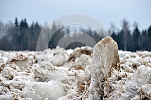 Spring flood threat. The ice jam on the river.