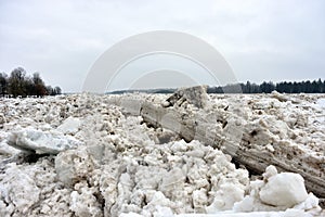 Spring flood threat. The ice jam on the river.