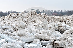 Spring flood threat. The ice jam on the river.