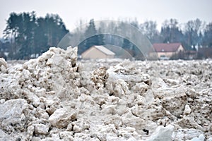 Spring flood threat. The ice jam on the river.