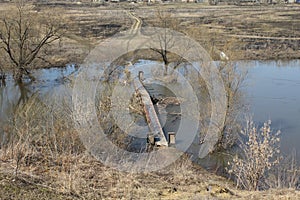 Spring flooding inundated the old bridge