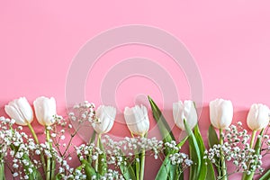 Spring flower arrangement on a pink background