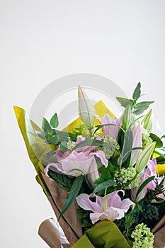 Spring flower bouquet on white background. Colorful vintage flower decoration. Tulips and roses in floreal bouquet