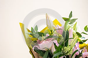 Spring flower bouquet on white background. Colorful vintage flower decoration. Tulips and roses in floreal bouquet