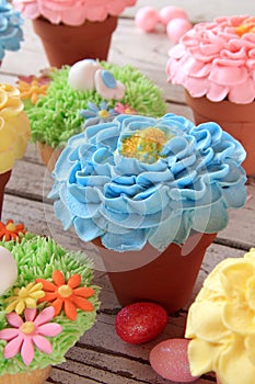 Spring flower cupcakes in pots.