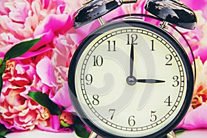 Spring flowers and Alarm Clock. Change the time.