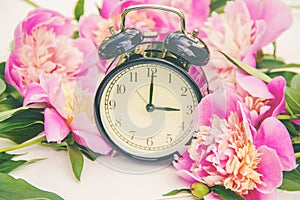 Spring flowers and Alarm Clock. Change the time