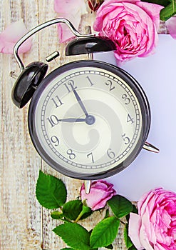 Spring flowers and Alarm Clock. Change the time