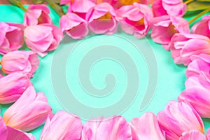 Spring flowers banner - bunch of pink tulip flowersbright colorful background.