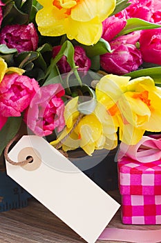 Spring flowers with blank tag