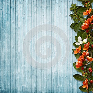 Spring flowers border on wooden boards