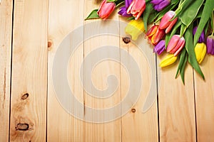 Spring Flowers bunch at wood floor texture. Beautiful Tulips bou