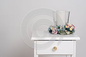 Spring flowers with candle