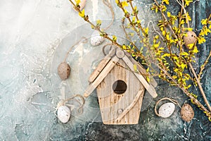 Spring flowers Easter eggs decoration Forsythia birdhouse