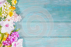 Spring flowers wooden background