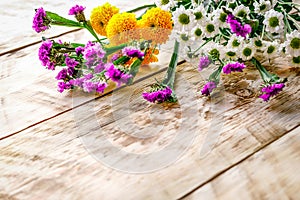 Spring flowers on wooden board