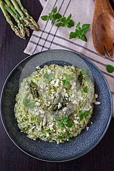 Spring food Delicious risotto with asparagus and wild garlic