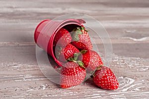 Spring fruits, strawberries in an aluminum bucket