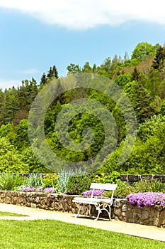 spring garden with a bench, Becov nad Teplou, Czech Republic