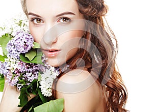 spring girl with lilac flowers.