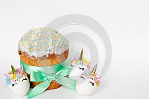 spring holiday. easter cake and white eggs unicorns