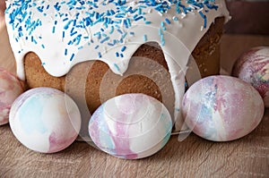Spring holiday prepare. Marble shell. Happy easter. Dessert. Backery. Easter cake with sprinkles on glaze. Painted eggs. Easter photo