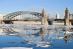 Spring ice drift near the Peter the Great bridge. Saint-Petersburg, Russia