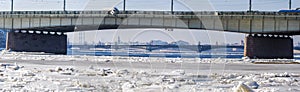 Spring ice drift on the Neva. Liteyny Bridge and Troitsky.