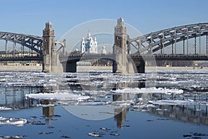 Spring ice drift at the Peter Great bridge. Saint-Petersburg