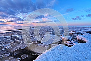 Spring ice Gauja river after sunset observing