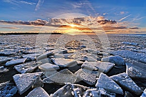 Spring ice Gauja river after sunset observing