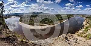 Spring Irkut river sky clouds landscape. View from above, Siberia, Russia