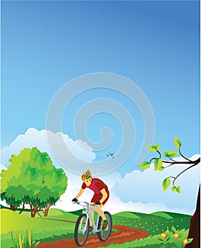 Spring landscape with a mountain biker.