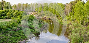 Spring landscape with the taiga Siberian river Vagay, Russia. Banner