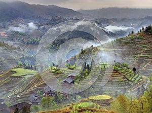 Spring landscape with village and rice terraces, mountain rural
