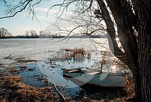 Spring landscape with wooden boat