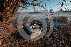 Spring landscape with wooden boat