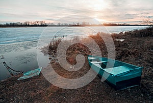 Spring landscape with wooden boat