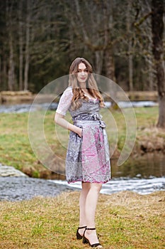 Spring magic in a dirndl: Woman enjoying nature in a meadow