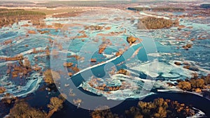 Spring melting river flood. Streaming water. Drone view