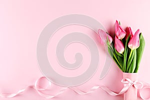 Spring mood concept. Pink flowers arrangement with a lot of copy space for text