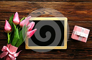 Spring mood concept. Pink flowers arrangement with a lot of copy space for text