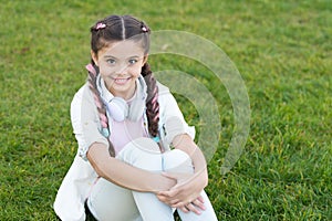 Spring mood. Mp3 player. little girl listen music. happy little girl. Audio book. Kid in headpset. Stylish child relax