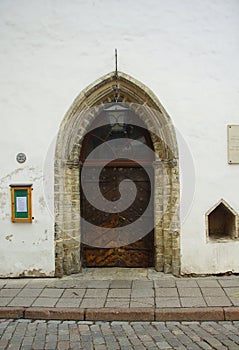 Spring morning city and a fragment of a medieval facade