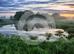 Morning. a picturesque foggy dawn by the river. Sun rays