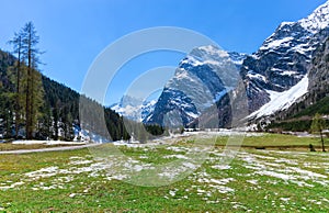 Spring mountain landscape with patches of melting snow, Austria, Tyrol, Karwendel Alpine Park