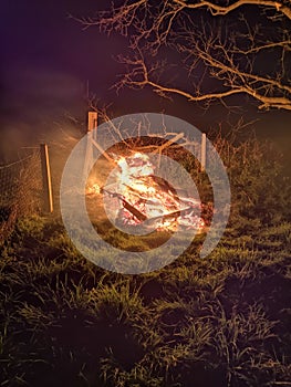 Spring night bonfire, beautiful capture of colours shadows and silhouettes.